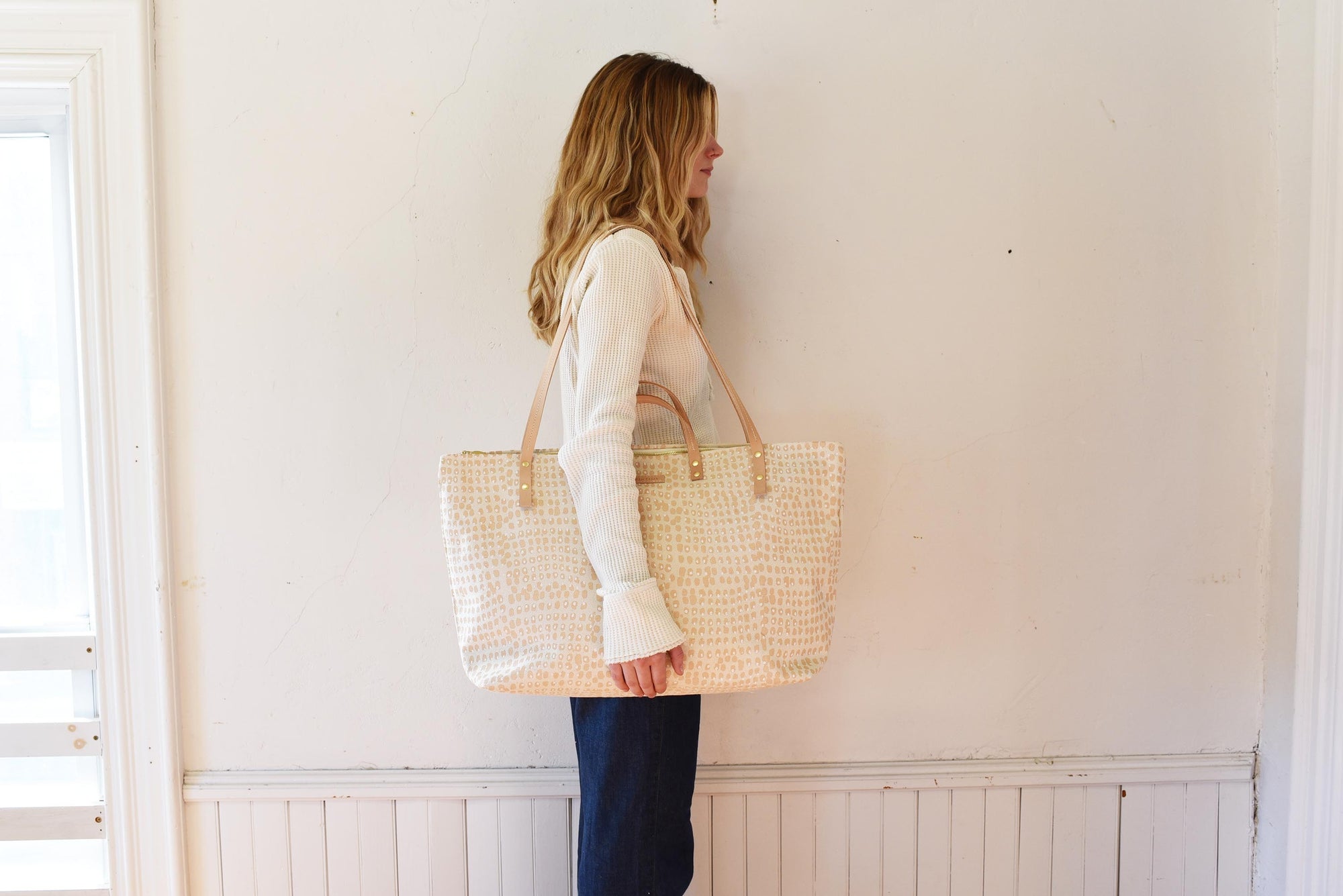 Woman holding Weekender Bag