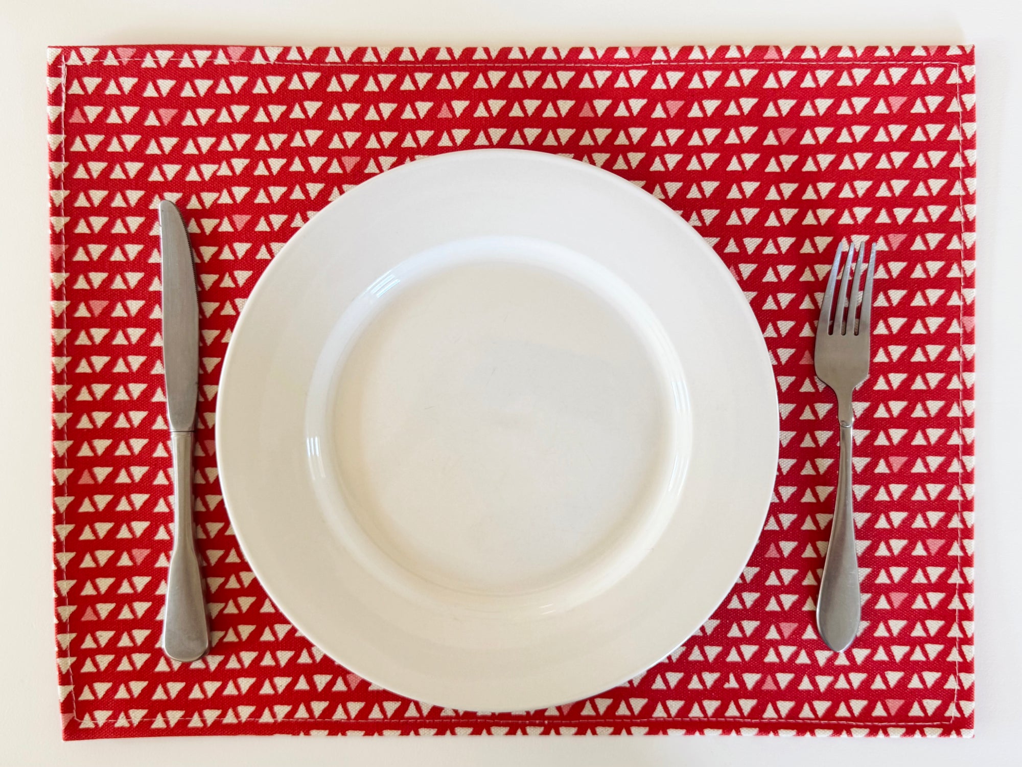 SET OF 4 PLACEMATS - RED TRIANGLES