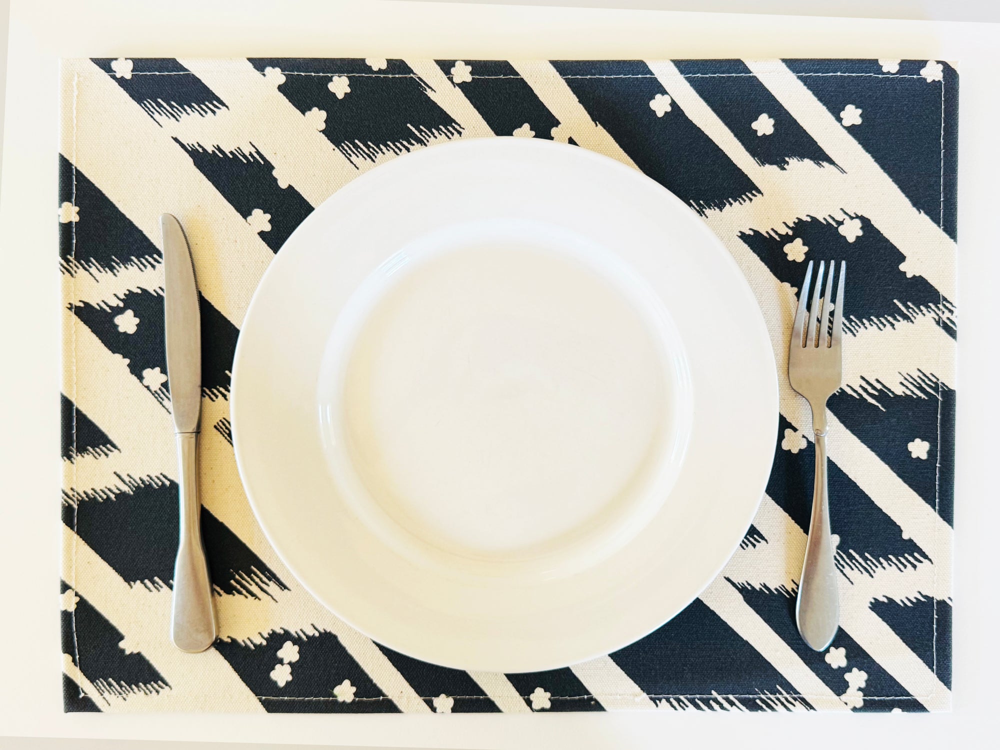 SET OF 4 PLACEMATS - WORN BLACK FLYING CARPET