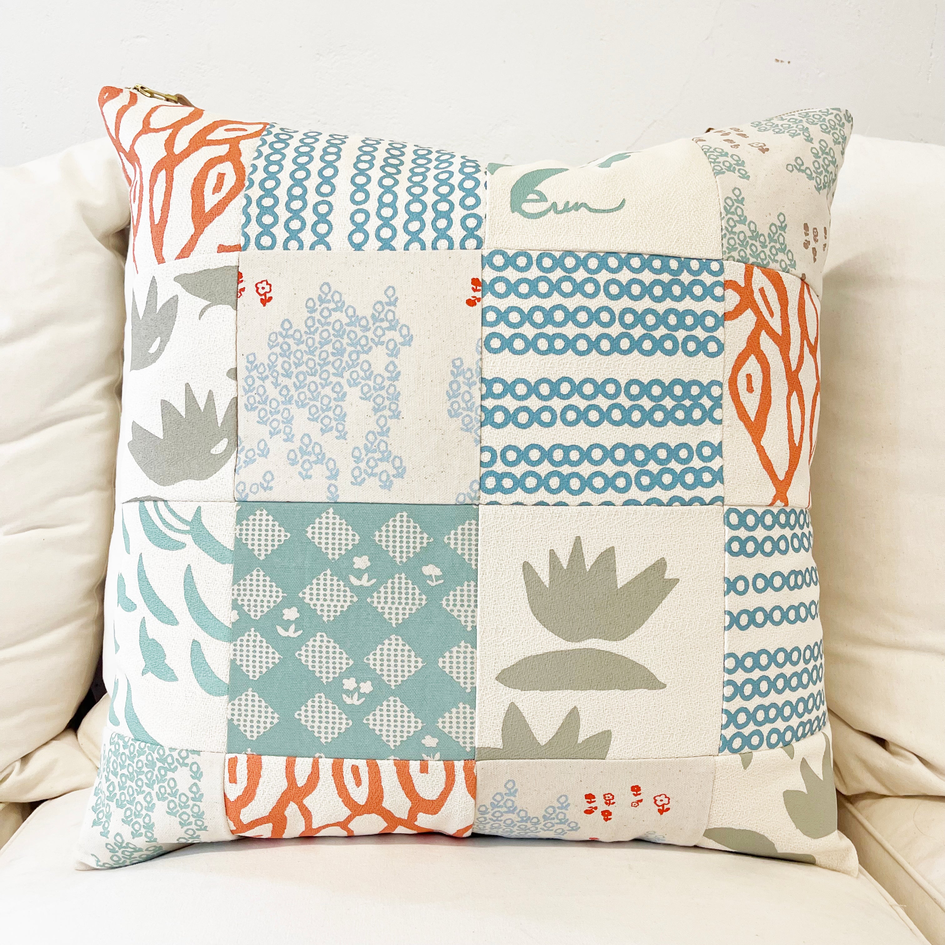 ONE OF KIND PATCHWORK PILLOW IN CORAL AND SEA BLUE