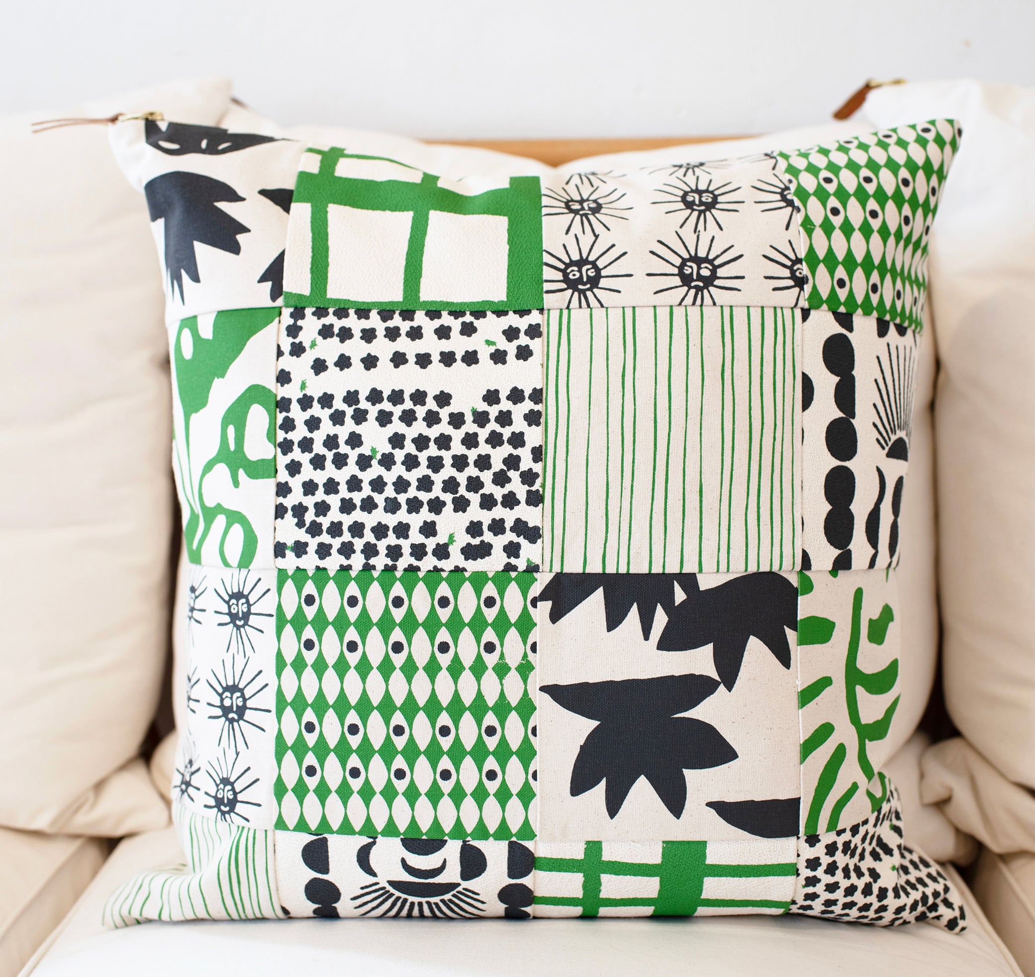 ONE OF A KIND PATCHWORK WORN BLACK AND KELLY GREEN PILLOW